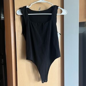 NWT Free People Black Tank Top Bodysuit. Size M-L.